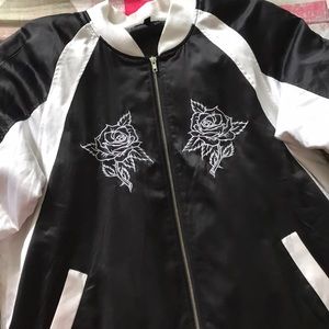 Black and white zip up jacket, no hoodie